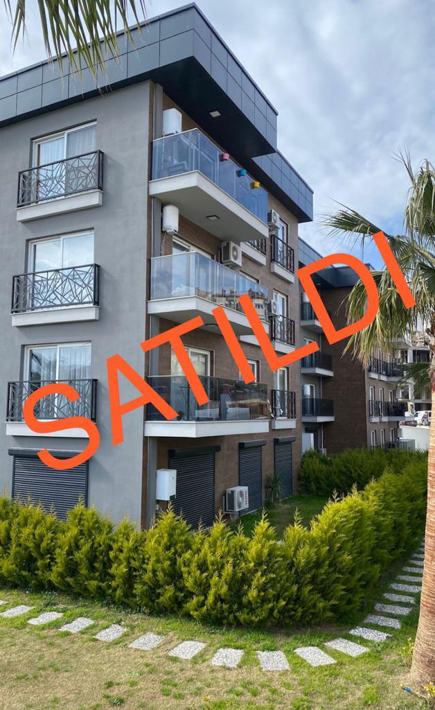 7098 KUŞADASINDA 2+1 SİTE İÇİNDE HAVUZLU LÜKS BAHÇEKATI DAİRE - 